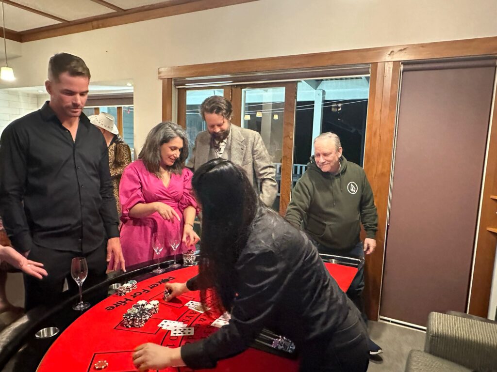 Casino night hire with poker table entertainment at an Auckland club event